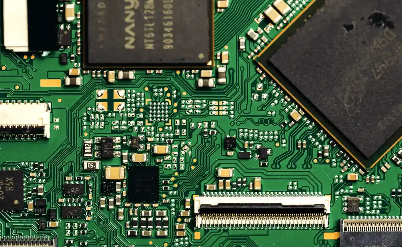 Stamped EMI shield components from a progressive die line in the electronics industry